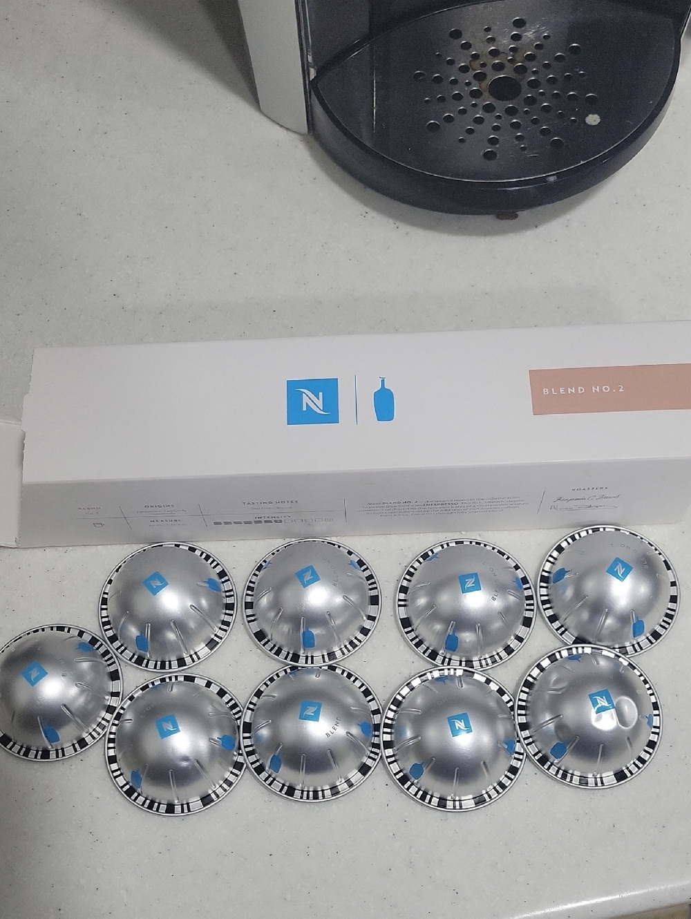 Nespresso Silver Capsules with Blue Logos